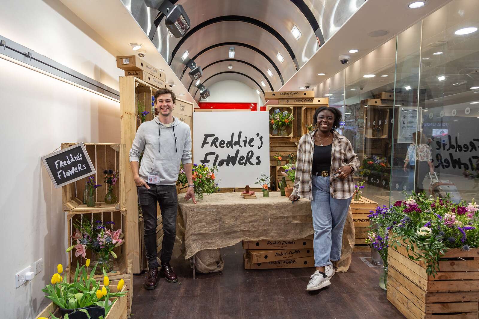 Freddie's Flowers Attracts Commuters at London Victoria Station